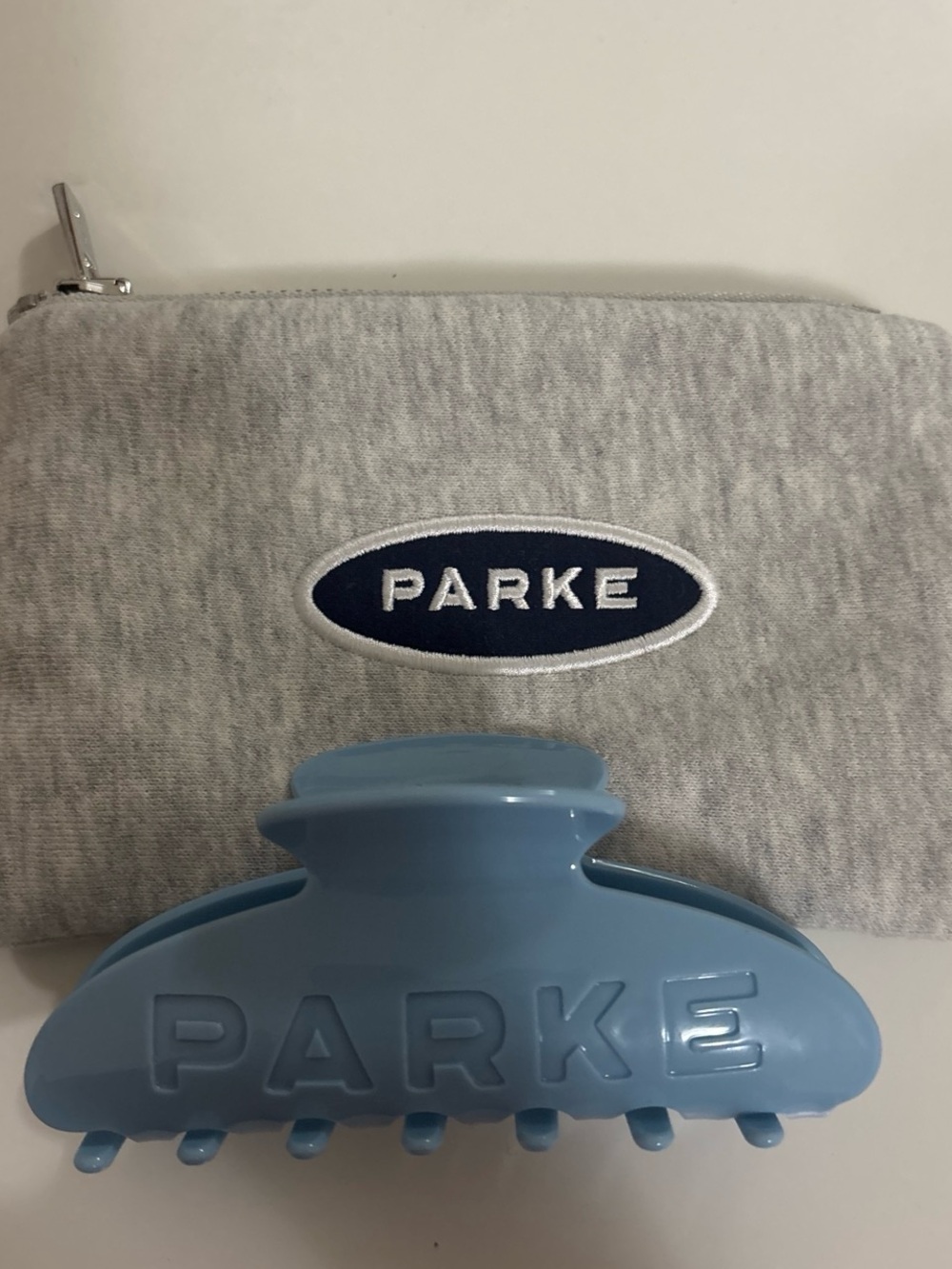 Parker Light Blue Hair Claw with Grey Logo Pouch